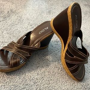 Women’s dark brown wedge Aldo brand size 9. Worn a few times.